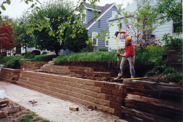 man working on wall
